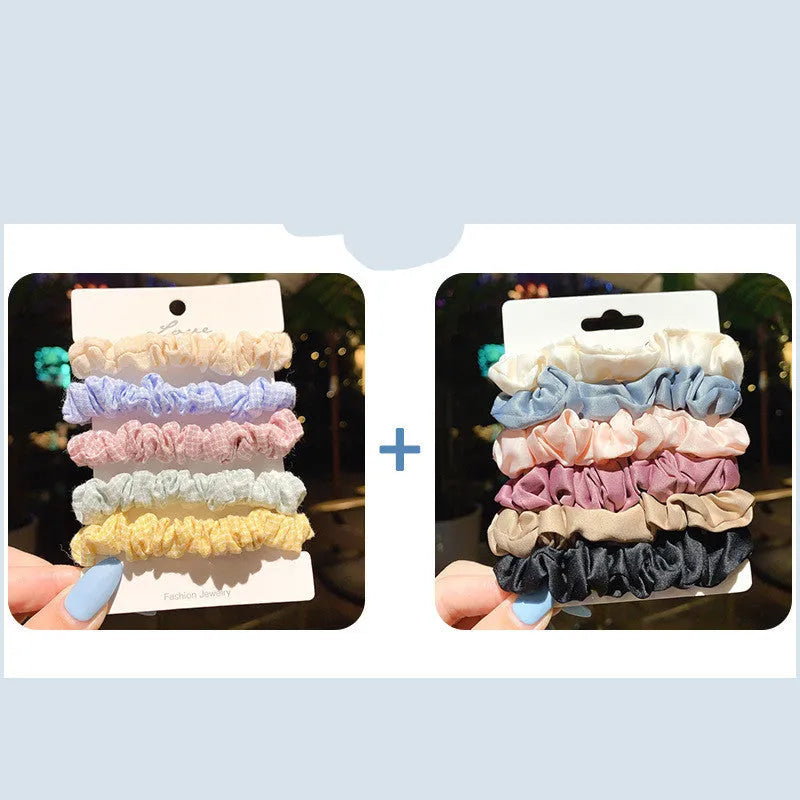Children's hair accessories set showing autumn colour rings and dark macaron style clips