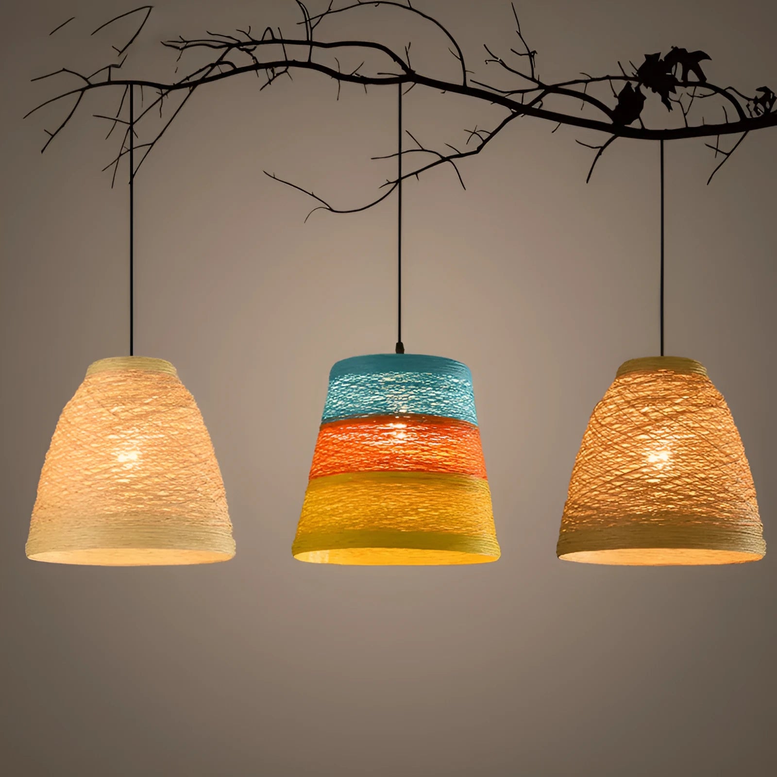 Woven rattan ball hanging lamp with adjustable cord on a light background.