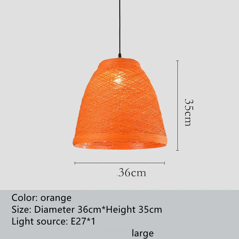 Woven rattan ball hanging lamp with adjustable cord on a light background.