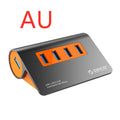 Dark grey aluminium USB hub with four orange-trimmed ports and a long black data cable.