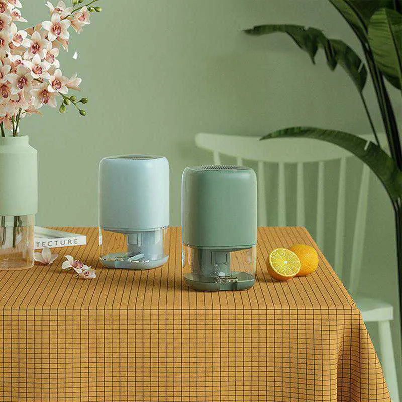 Portable mini dehumidifier in blue colour with 0.7 litre water tank capacity