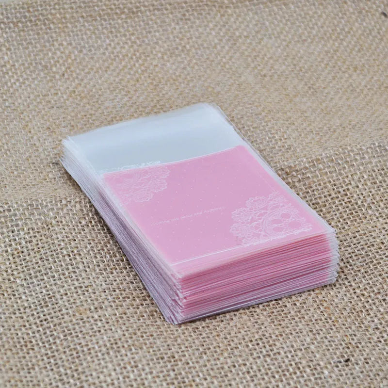 Pink self-adhesive plastic packaging bags for handmade soap with UV printed finish