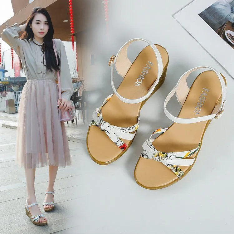 Women's pink wedge sandals with a thick heel, non-slip sole, and a single buckle fastening.