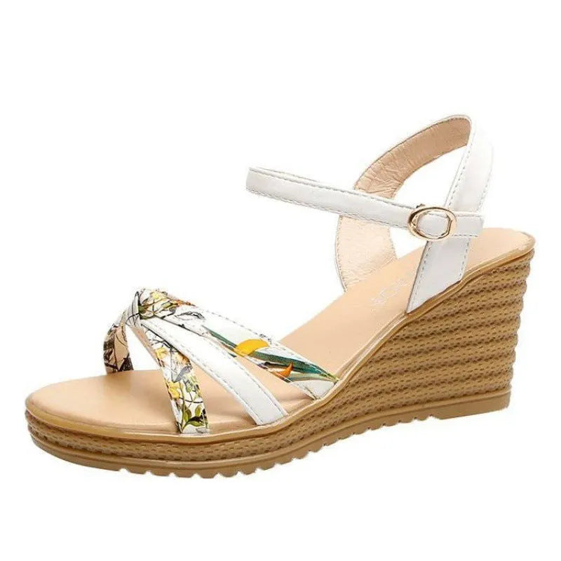 Women's pink wedge sandals with a thick heel, non-slip sole, and a single buckle fastening.