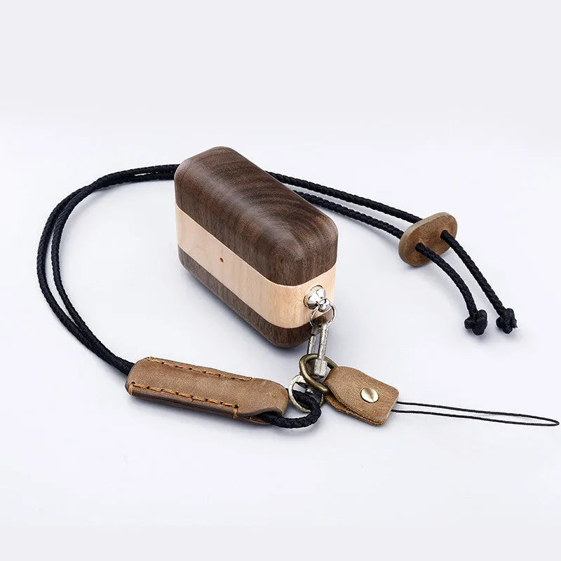 Solid wood Bluetooth earphone sleeve in bamboo finish with lanyard for wireless earphone case protection