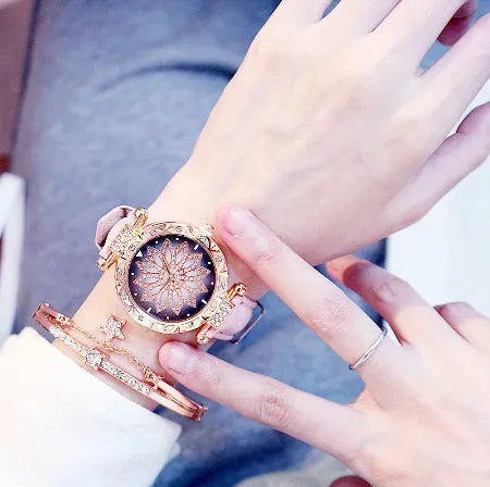 Round 32mm women's diamond watch with a PU case on a wrist, showing colour options like red, purple, and black.