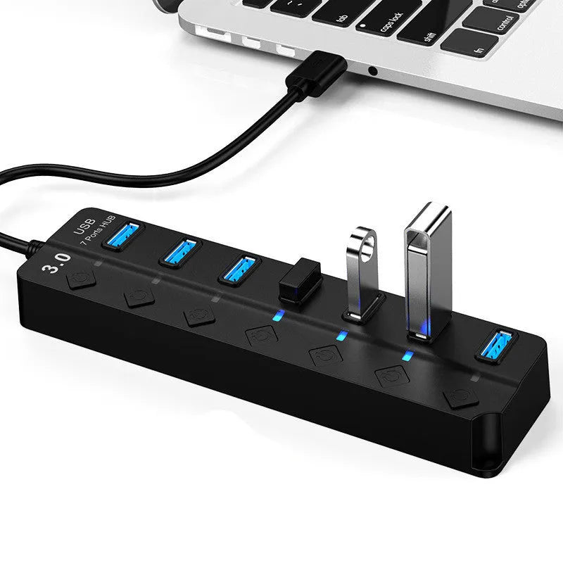 Black 7-port USB 3.0 hub with individual power switches and external power adapter