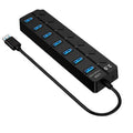Black 7-port USB 3.0 hub with individual power switches and external power adapter