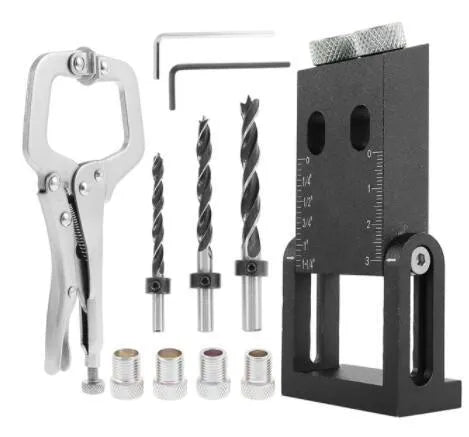 Black aluminium woodworking dowelling jig with drill bits and sleeves for precise hole alignment.