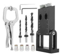 Black aluminium woodworking dowelling jig with drill bits and sleeves for precise hole alignment.