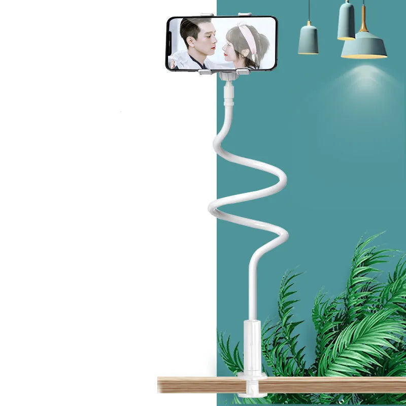 Blue clamp-on mobile phone holder with flexible memory alloy arm attached to a bedside table