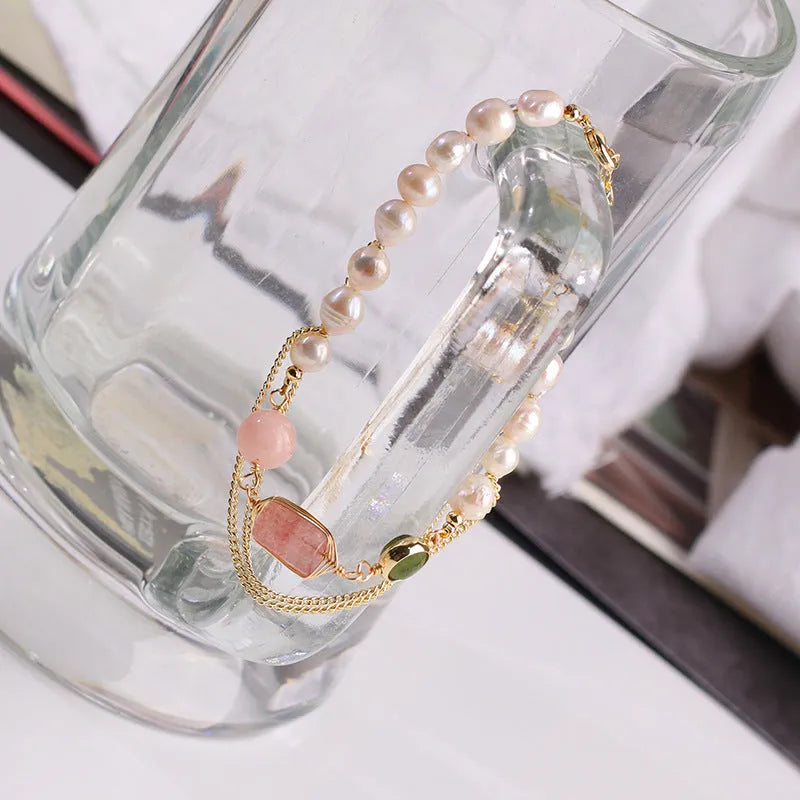 Pink UG309 geometric women's bracelet made with natural freshwater pearls and strawberry crystals.