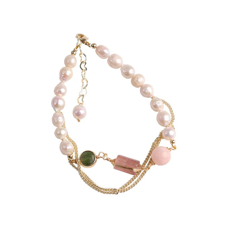 Pink UG309 geometric women's bracelet made with natural freshwater pearls and strawberry crystals.
