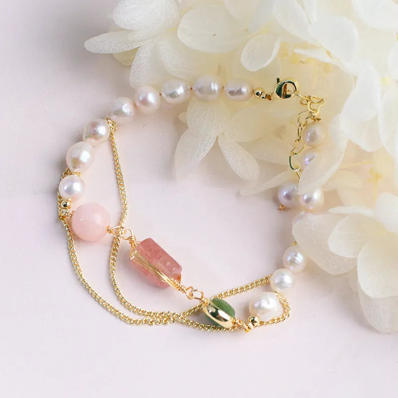 Pink UG309 geometric women's bracelet made with natural freshwater pearls and strawberry crystals.