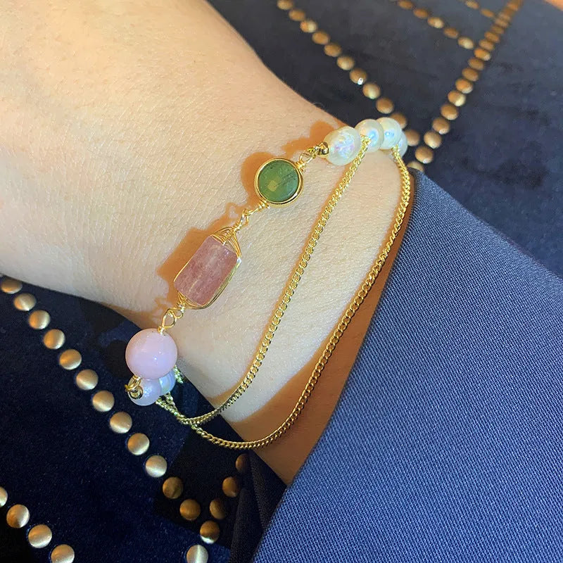 Pink UG309 geometric women's bracelet made with natural freshwater pearls and strawberry crystals.
