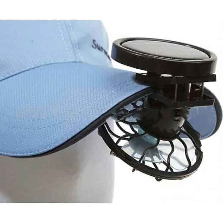 Black solar clip-on fan for outdoor cooling during camping and fishing trips