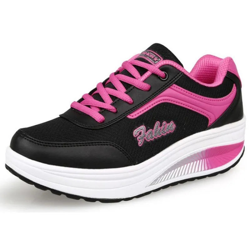 Women's heelless single shoe in black with a medium heel, shown on a plain background.