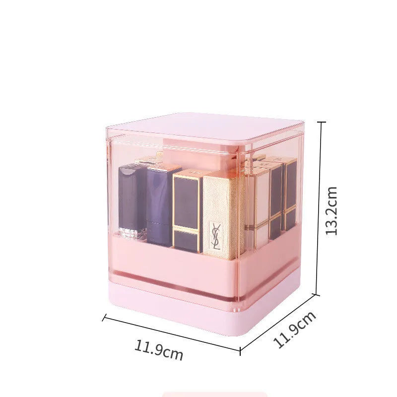 White press lift lipstick storage box with clear dust cover on a desktop, showing organised lipsticks.