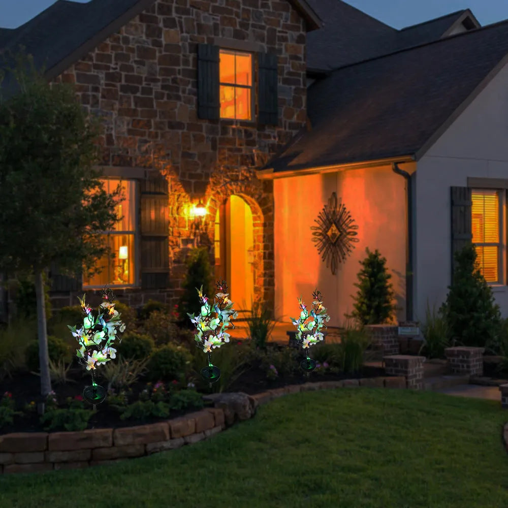 Solar-powered cherry tree branch garden light with firework string decoration