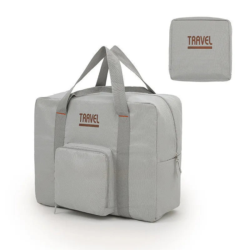 Black cube-shaped portable travel storage bag made from Oxford cloth with a sealed closure.