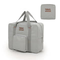 Black cube-shaped portable travel storage bag made from Oxford cloth with a sealed closure.