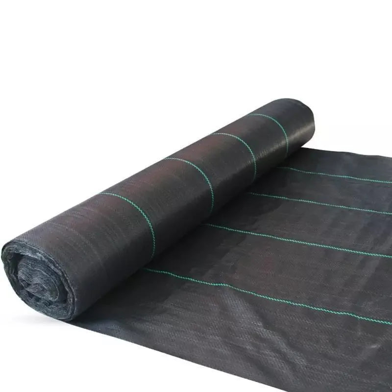 Black composite woven PE weed cloth roll for farmland and greenhouse weed suppression.