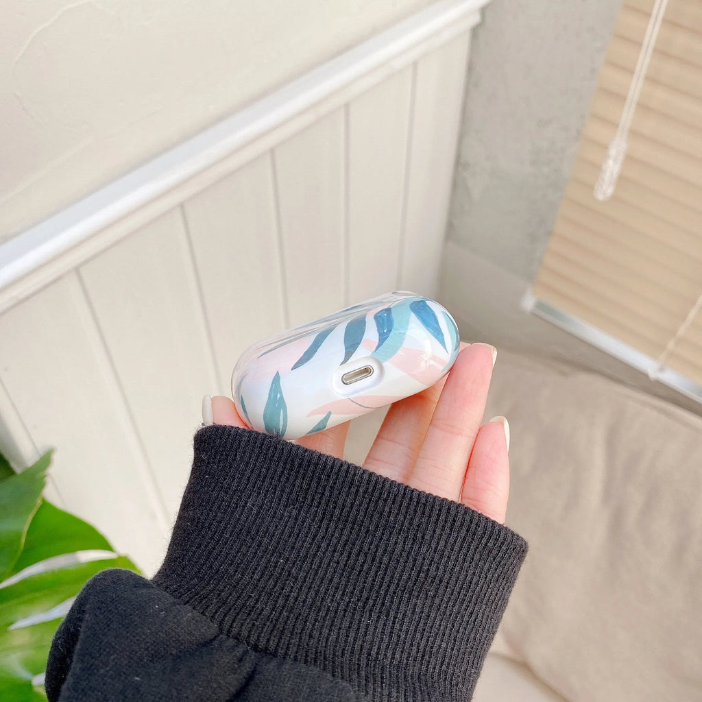 Blue and green banana leaf design soft TPU protective case for Apple AirPods.