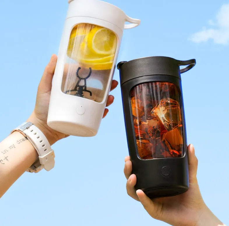 Portable personal blender in black, blue, pink or white colours showing 650ml cup with integrated blades
