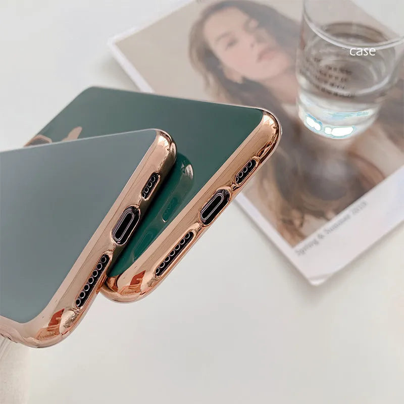 Simple solid colour TPU phone case for iPhone in blue, shown on a phone.