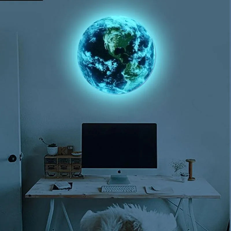 Glow in the dark blue and green Earth planet wall sticker on a bedroom wall.