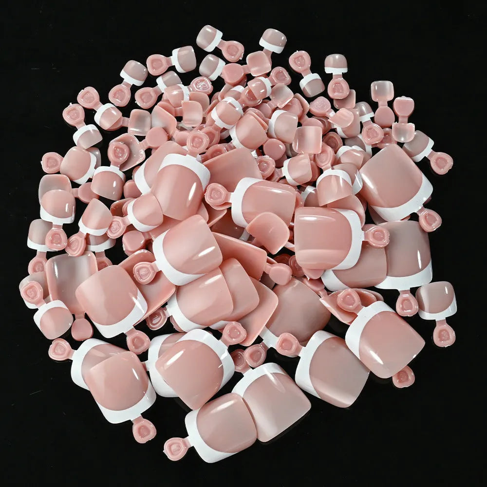 Box of 120 French white tip artificial toenails in nude colours, square short shape.
