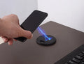 Round embedded wireless phone charger for installation in desks and furniture, shown with USB port.