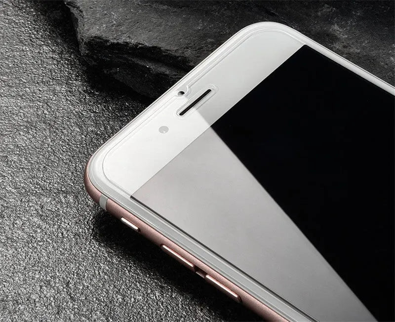 Tempered glass screen protector with 9H hardness for mobile phones on a clean background.