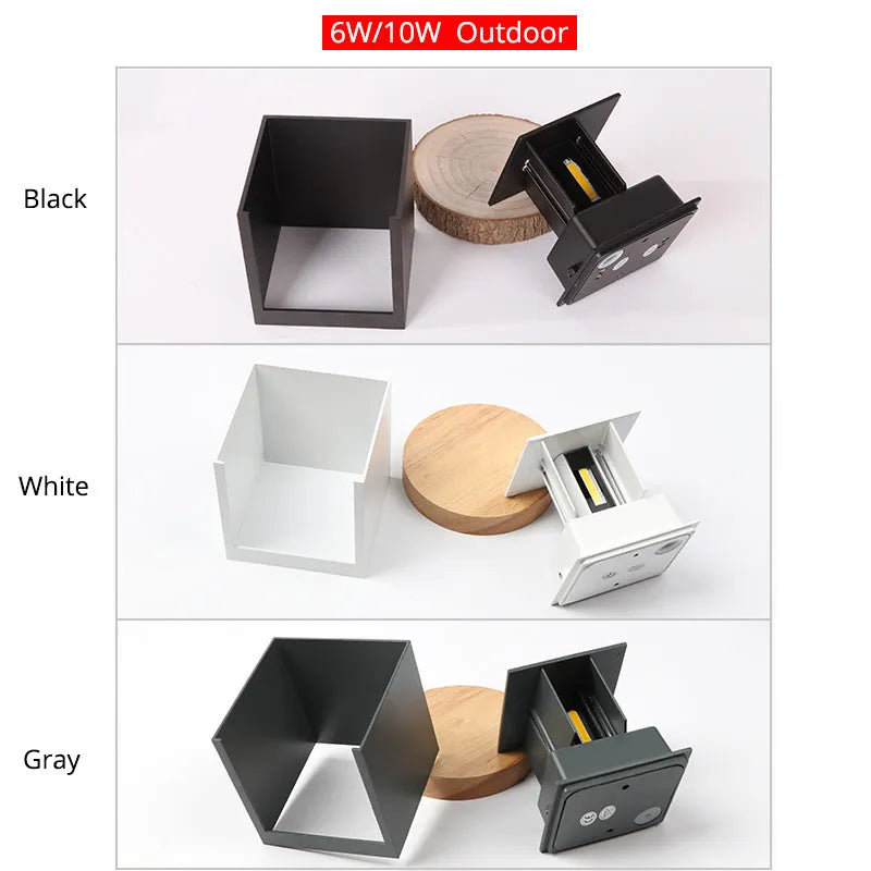 Compact cubic corridor wall lamp in black finish with adjustable colour temperature settings