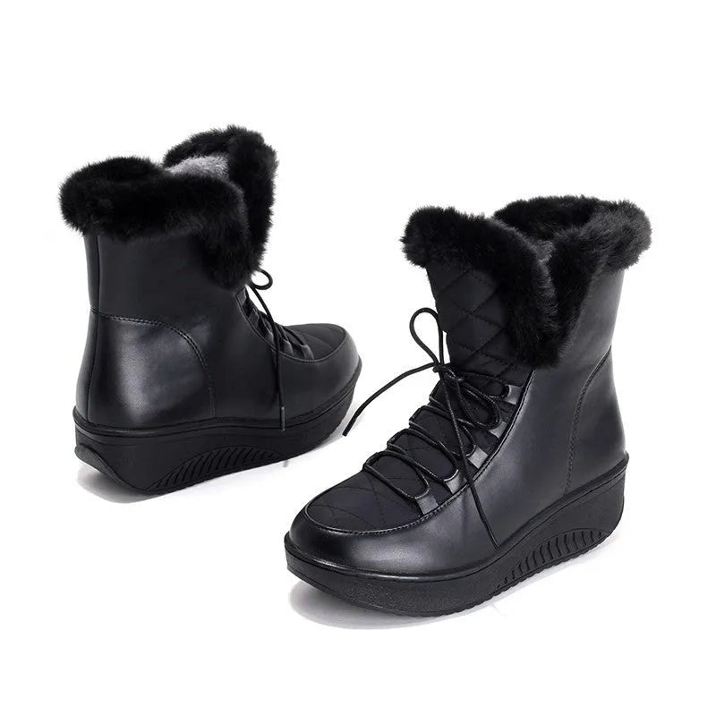 Women's black water-resistant winter boots with lace-up closure and 3cm platform sole