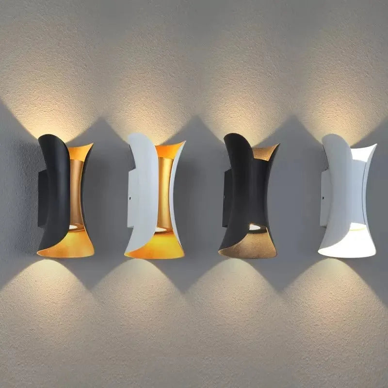 An elongated aluminium outdoor wall lamp mounted on a wall, suitable for stairs and corridors.