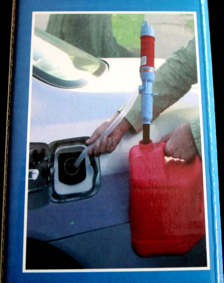 Red and blue manual hand pump siphon for transferring fuel oil and gasoline