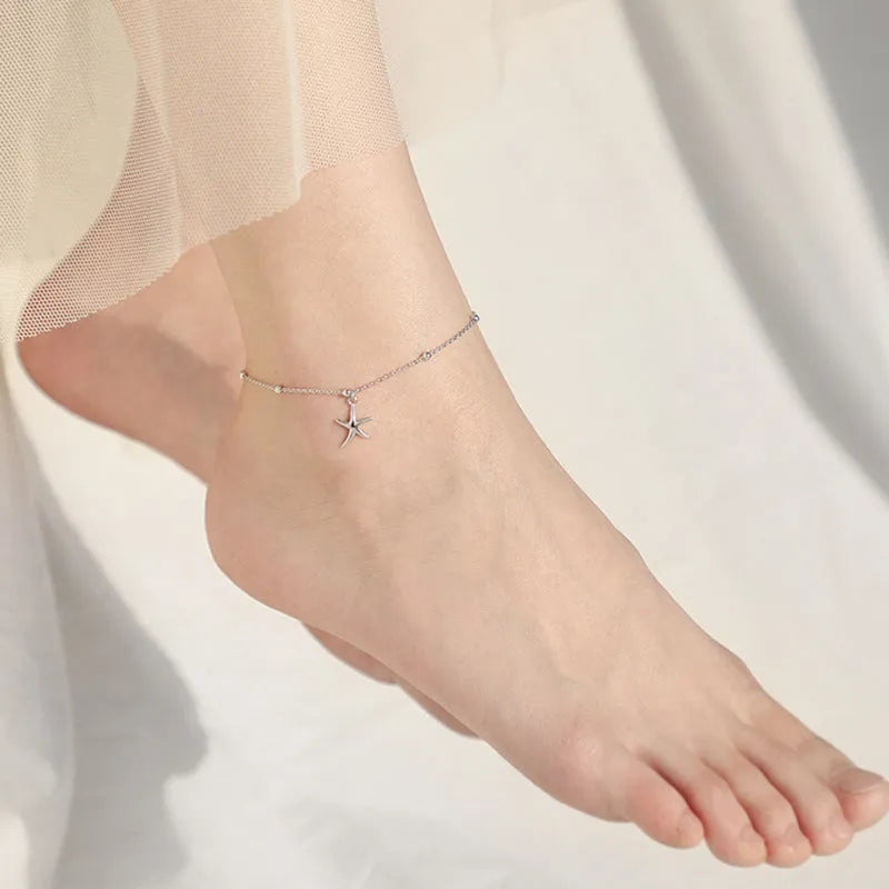 Women's sterling silver anklet with a starfish charm on a round bead chain