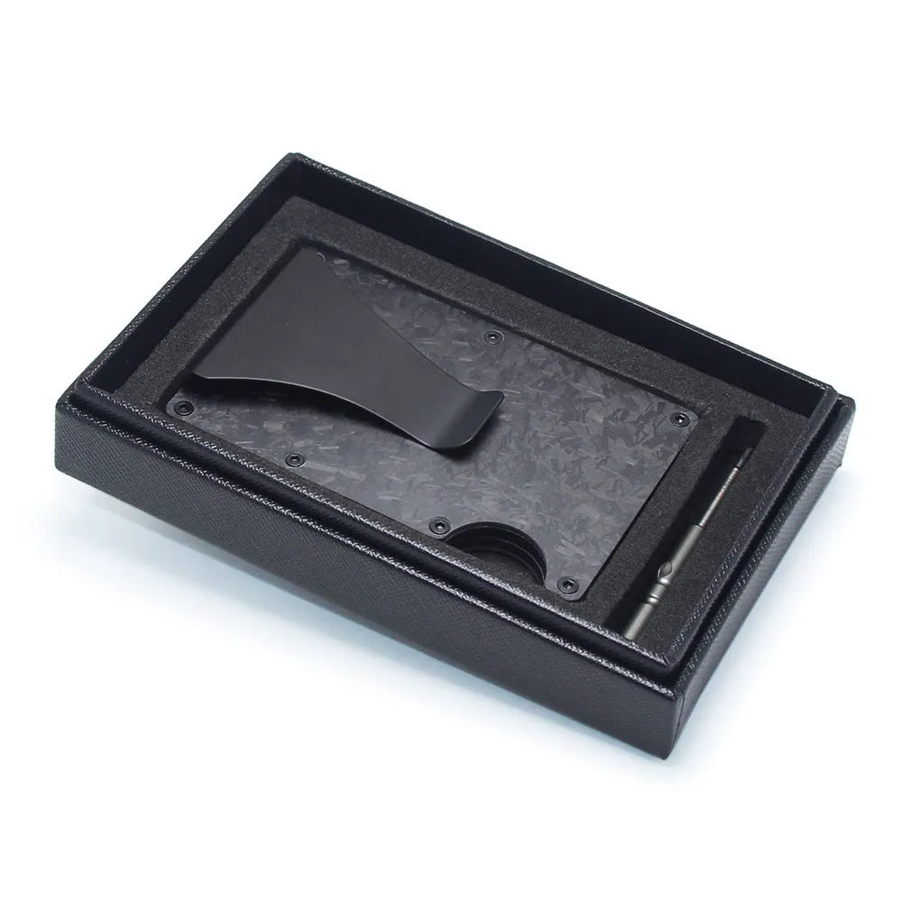 Carbon fibre and aluminium card wallet with geometric design holding multiple cards