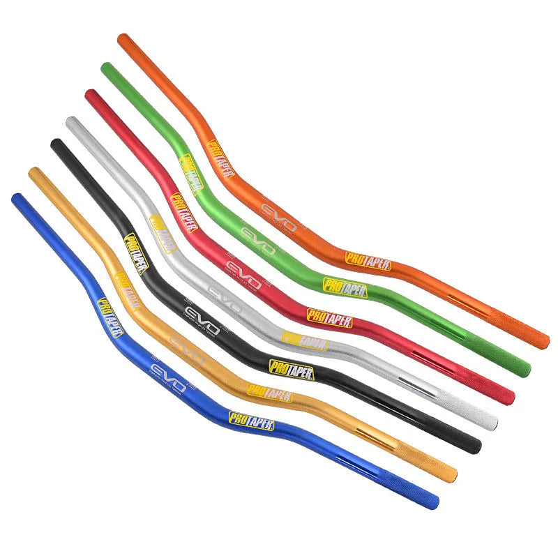 Orange aluminium alloy scrambling motorcycle handlebar showing 28mm diameter clamp area.