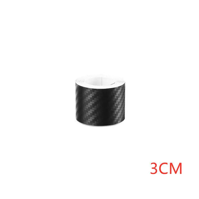 Matte carbon fibre car door sill protector roll showing 3D textured pattern with adhesive backing