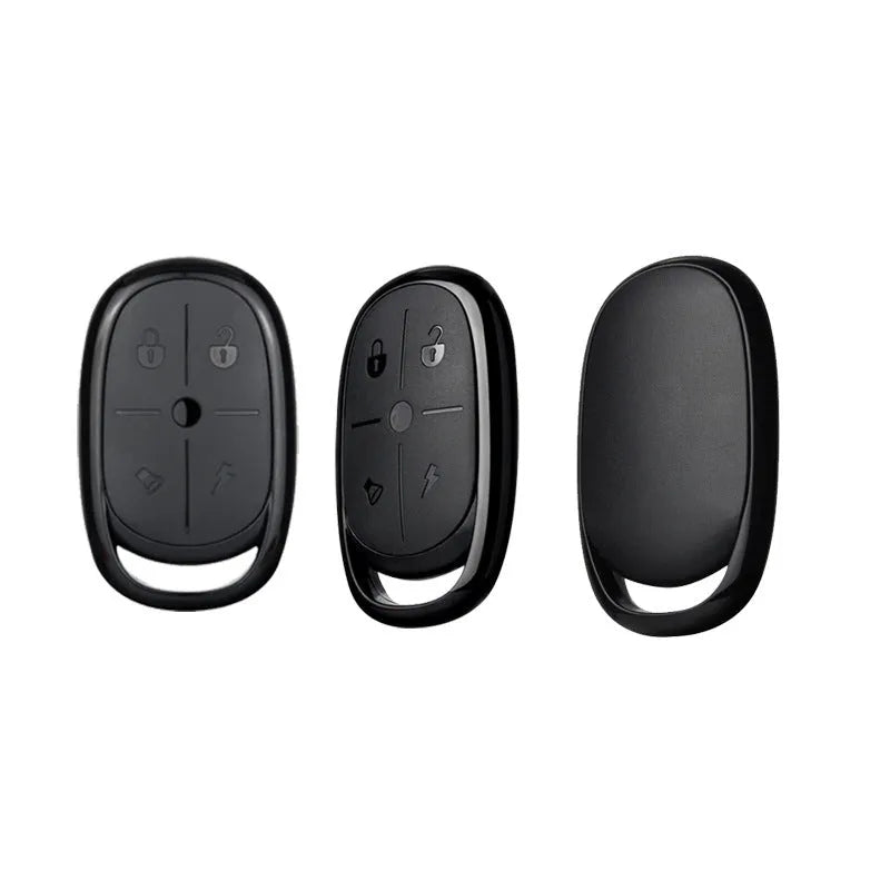 Compact ABS plastic 433MHz wireless car remote control duplicator on a keyring.