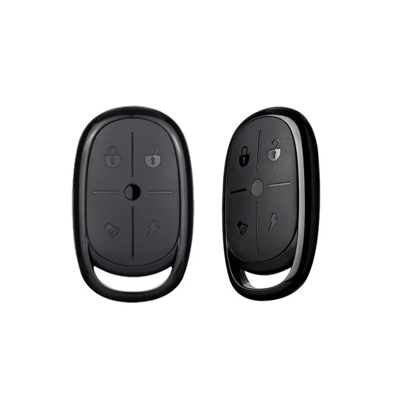 Compact ABS plastic 433MHz wireless car remote control duplicator on a keyring.