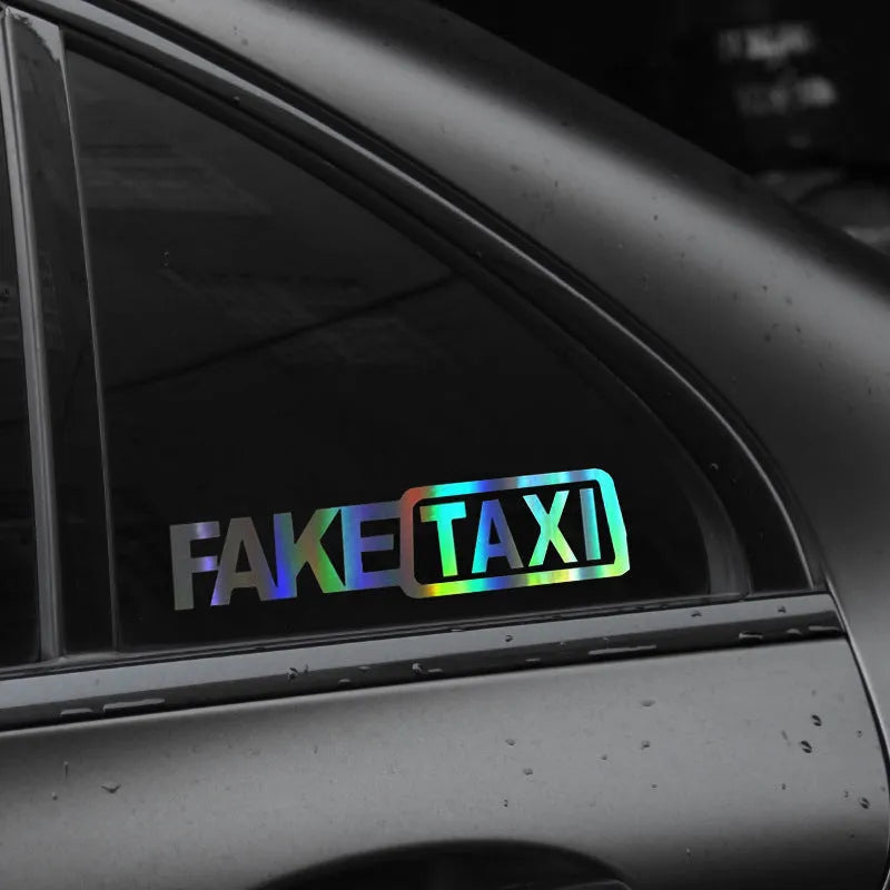 FAKE TAXI text car sticker in black, white, or yellow, measuring 20 cm by 8 cm.