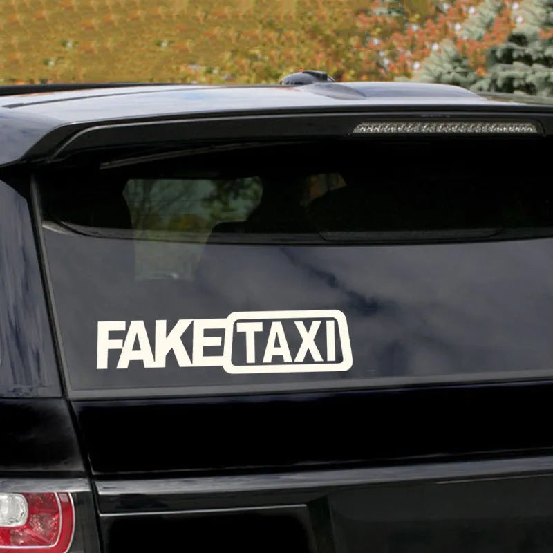FAKE TAXI text car sticker in black, white, or yellow, measuring 20 cm by 8 cm.