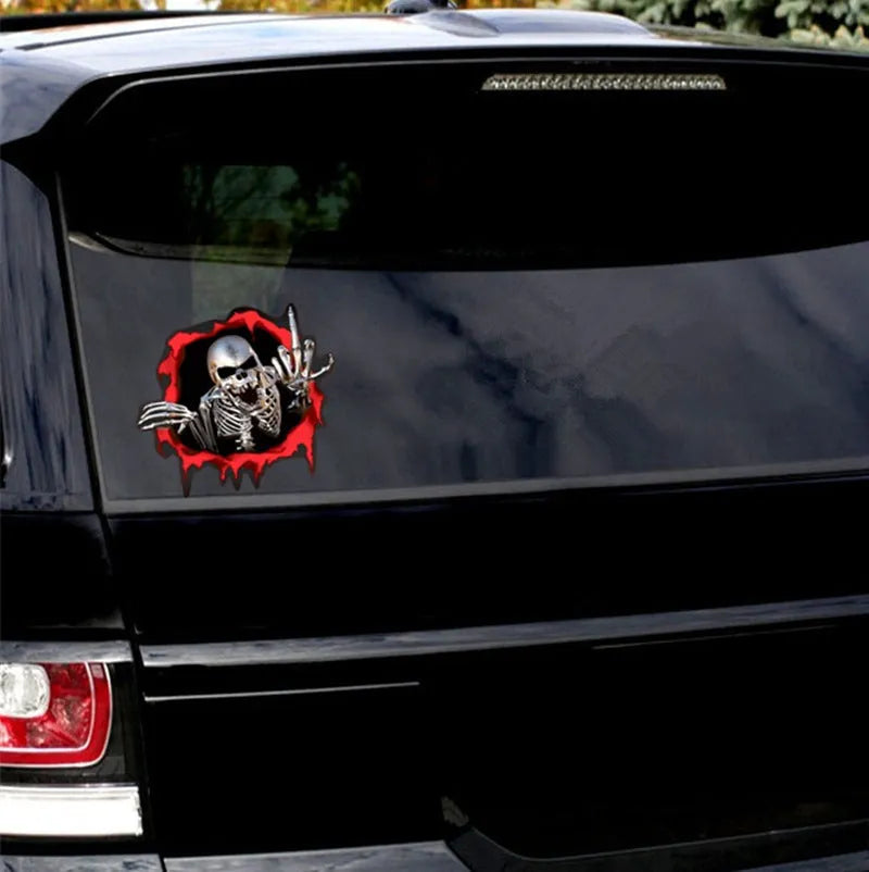 Reflective car sticker with metal skull and colourful broken shell pattern measuring 15cm by 14cm