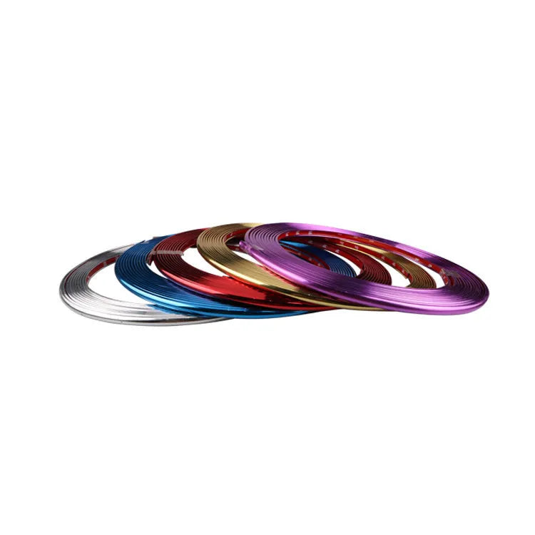 Roll of electroplated purple PVC wheel hub trim and a separate anti-collision strip on a white background.