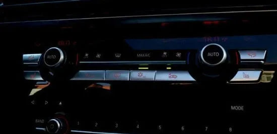 Silver car dashboard air conditioner button panel replacement set for climate control.