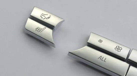 Silver car dashboard air conditioner button panel replacement set for climate control.