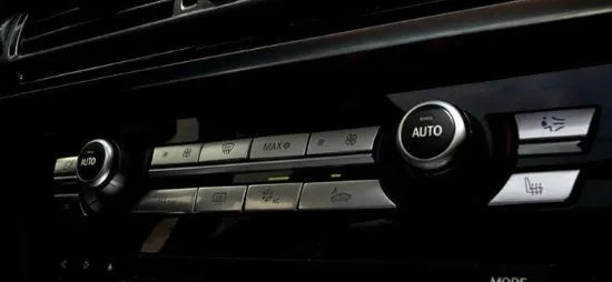 Silver car dashboard air conditioner button panel replacement set for climate control.